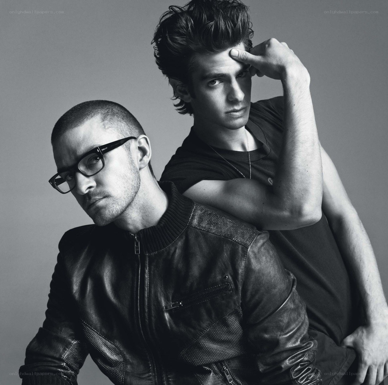 two men posing in black and white