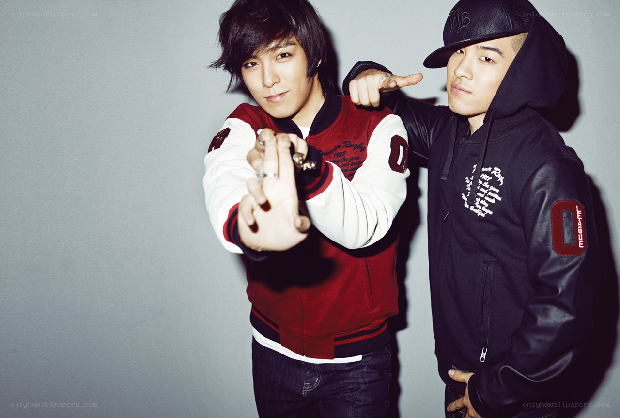 two men posing in casual wear