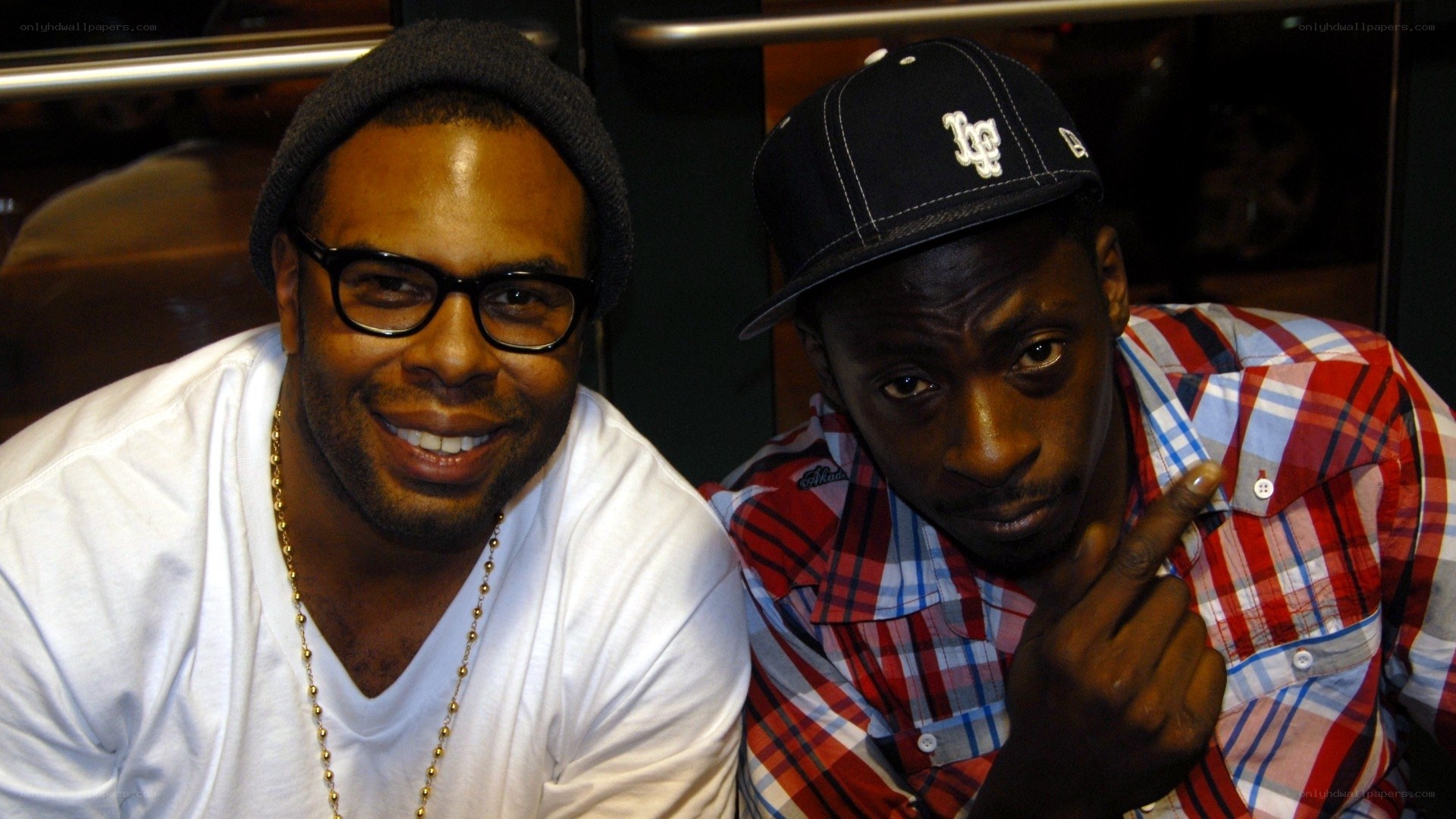 two men posing together