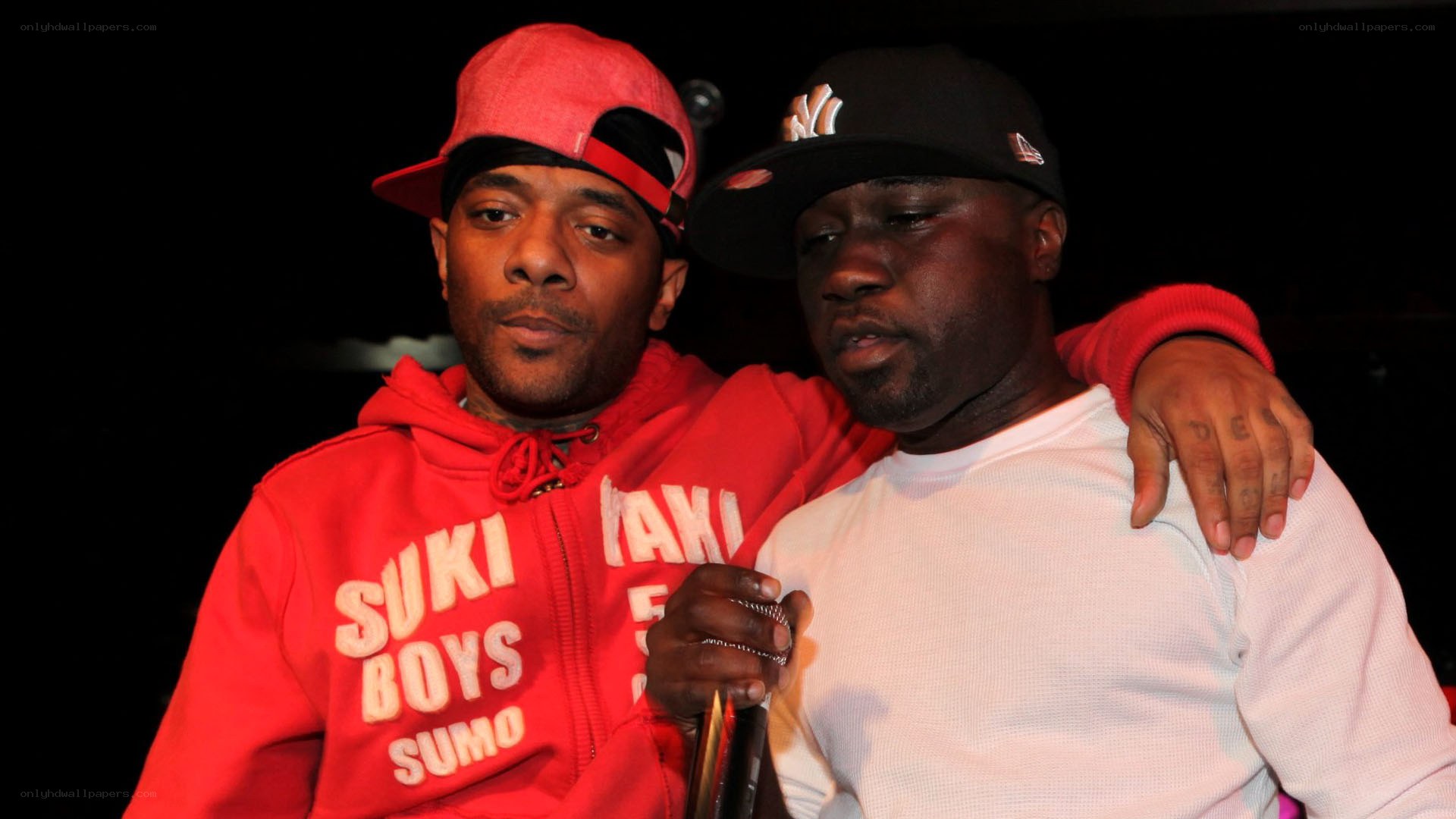 Two men posing together