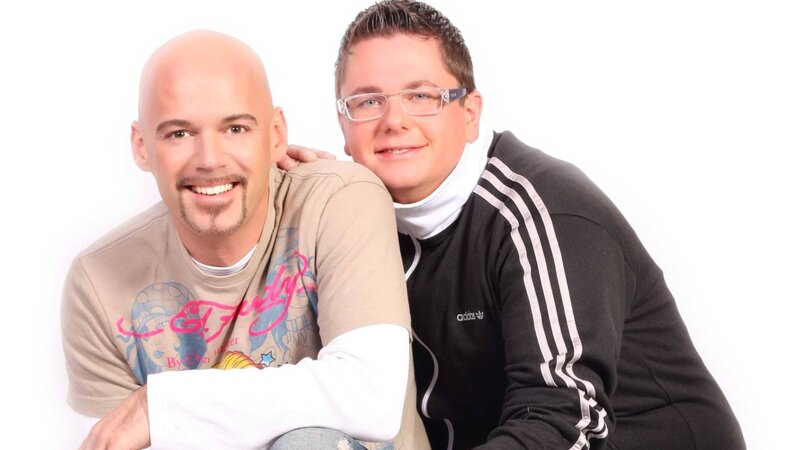 Two Men Posing Together — White