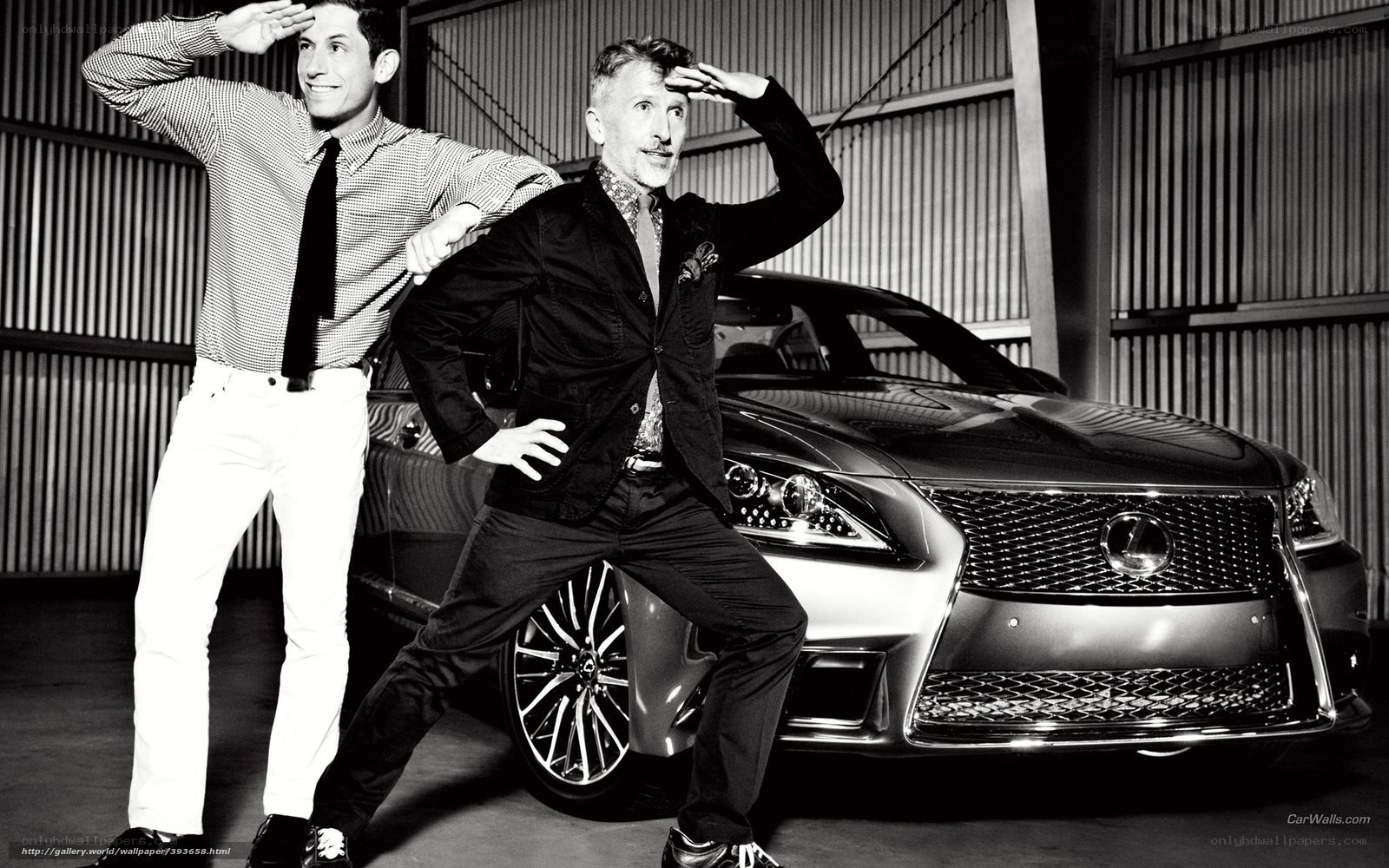 Two men posing with a Lexus