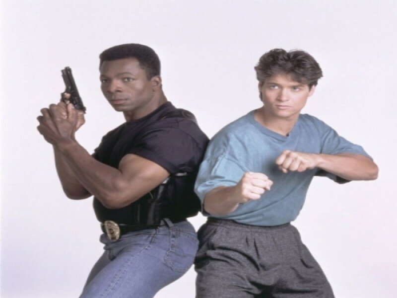 Two Men Posing with Weapons