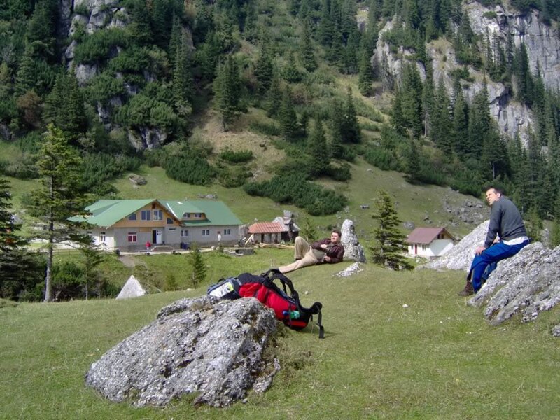 Two Men Resting on Hillside