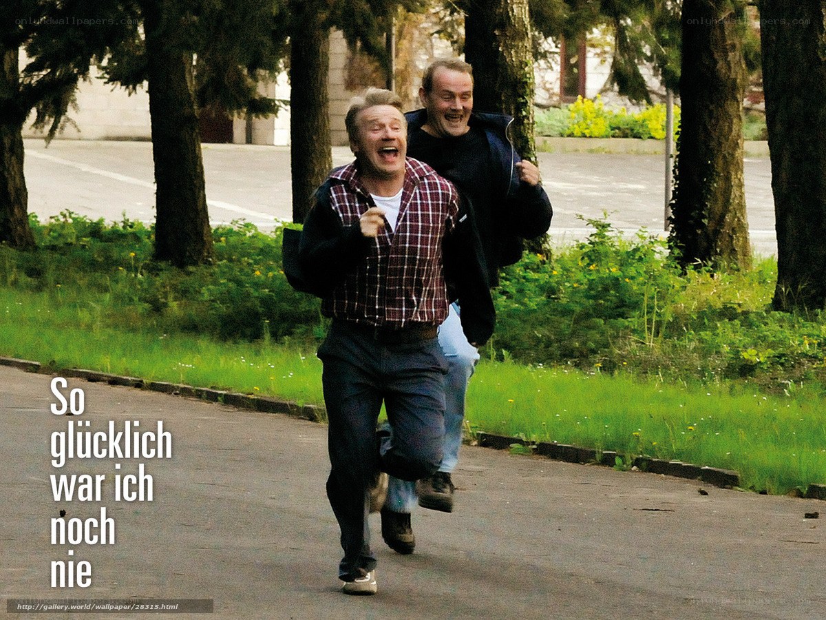 Two men running happily