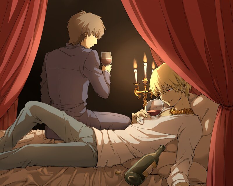 Two men sharing wine in a tent