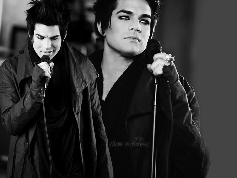 Two Men Singing into Microphones