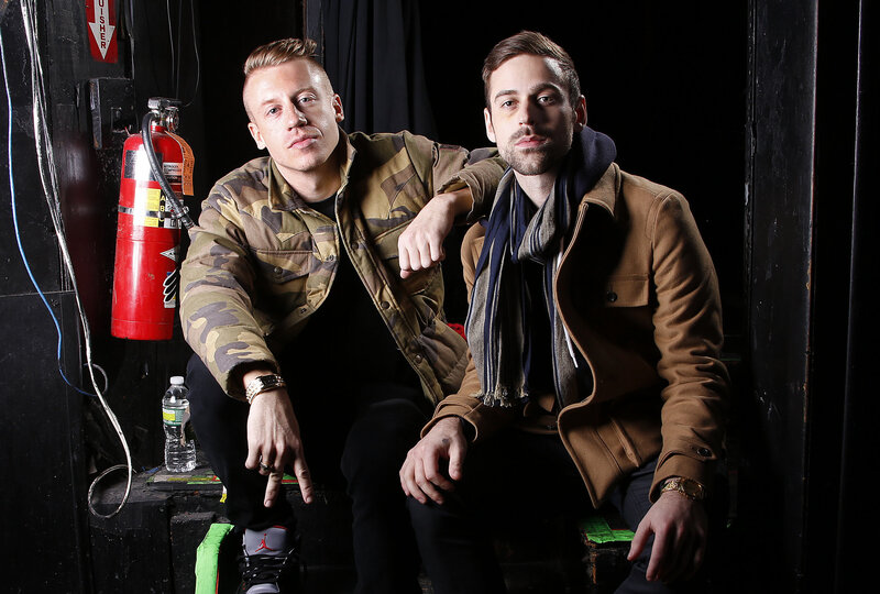 Two Men Sitting — Black