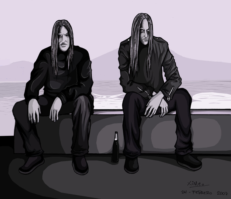 Two men sitting by the water