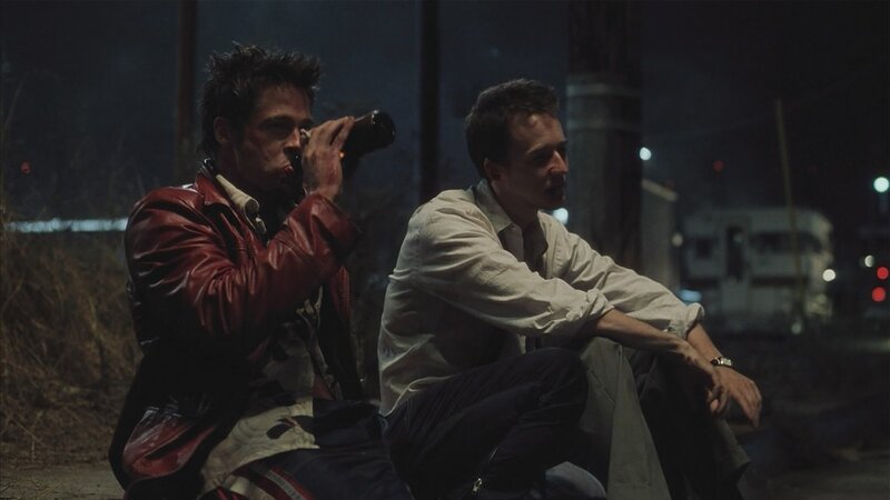 Two Men Sitting on Ground — Black, Dark