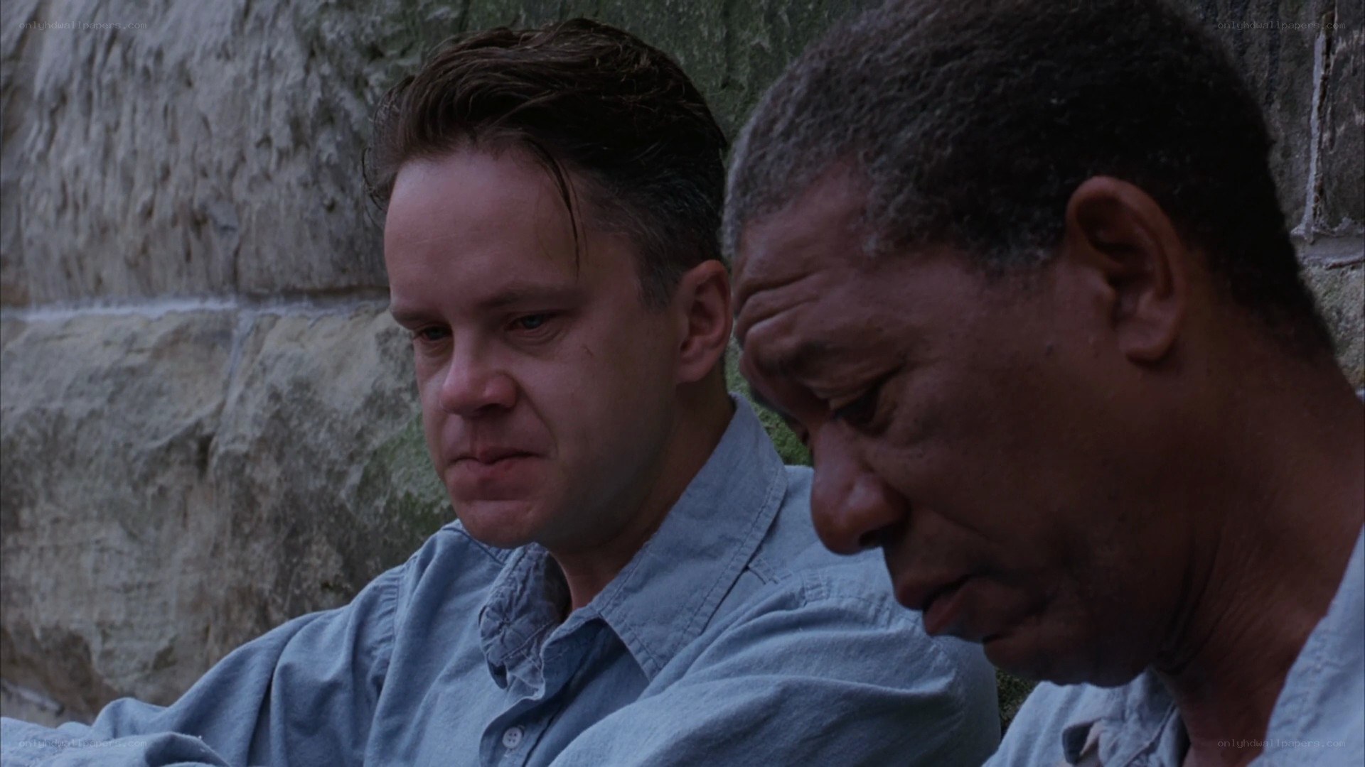 two men sitting together