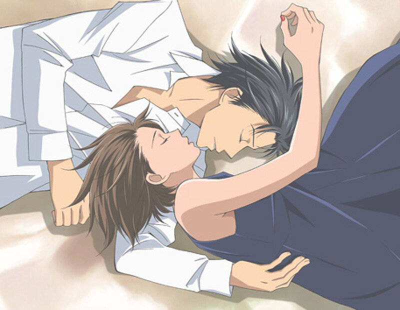 Two men sleeping together
