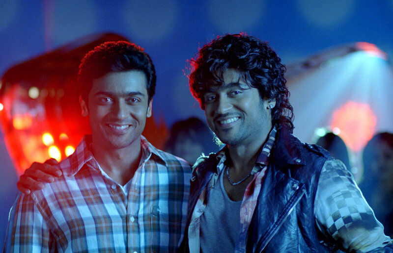 Two Men Smiling Together — Blue