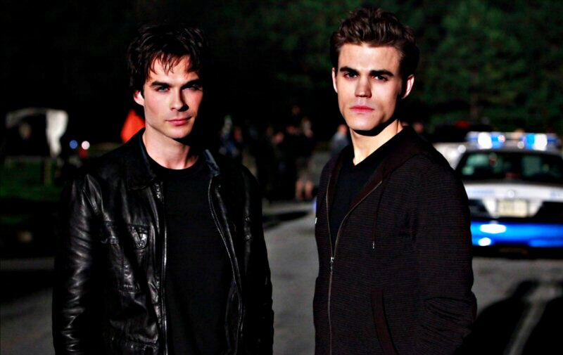 Two Men Standing — Black, Serious, Night