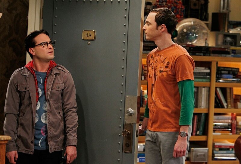 Two Men Standing in Hallway