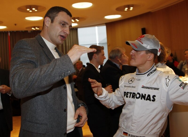 Two men talking at an event