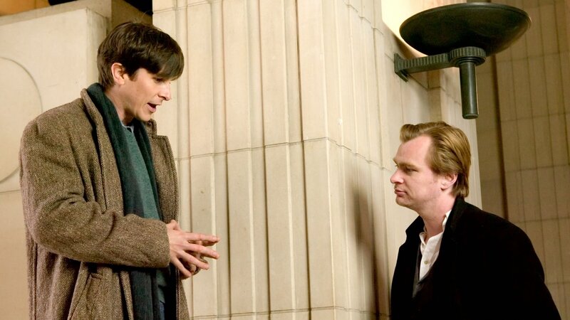 Two Men Talking — Brown, Dramatic, Photograph