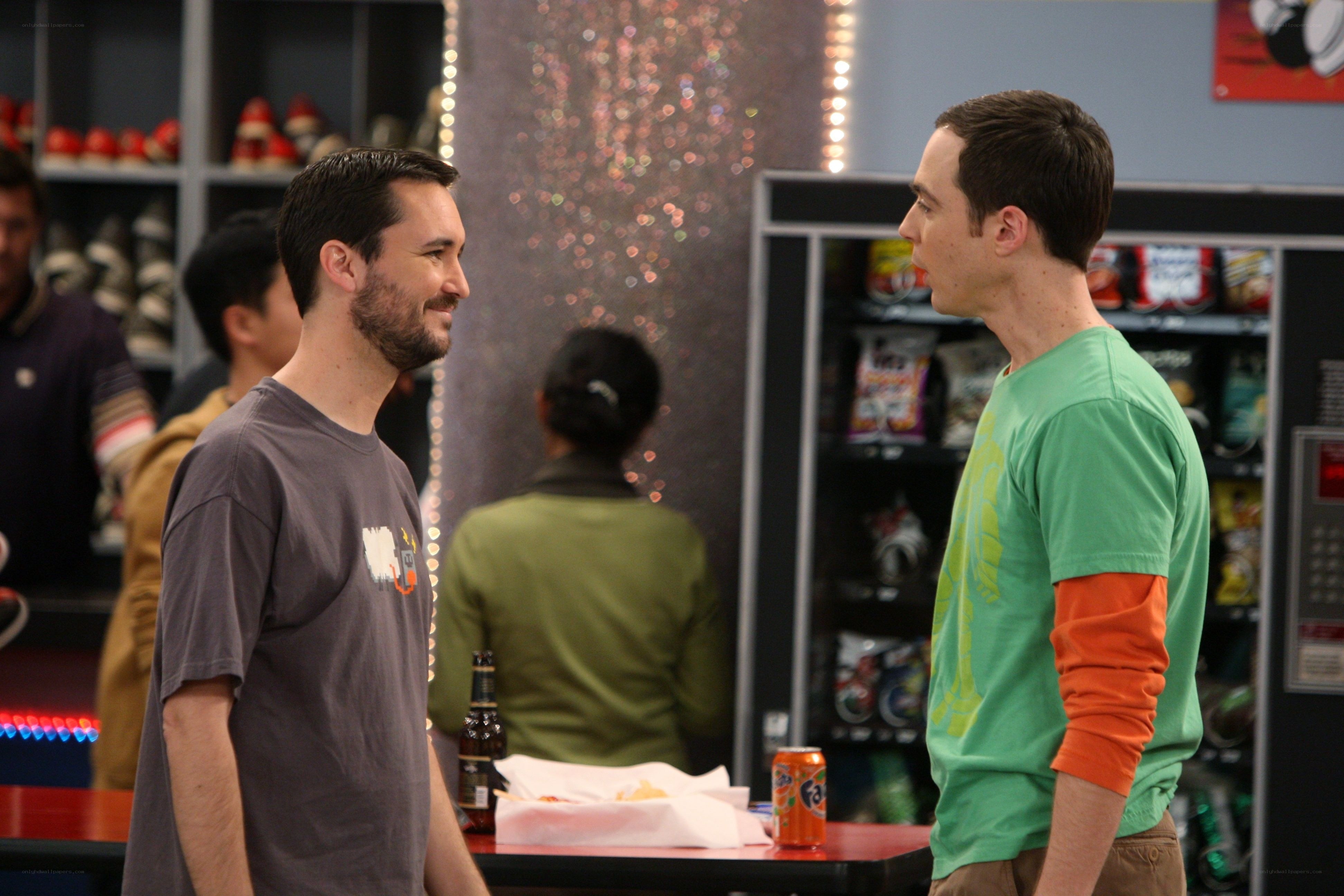 Two men talking in a game store