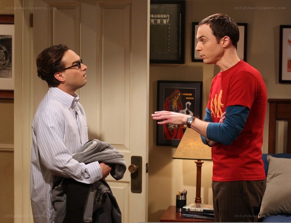 Two men talking in apartment