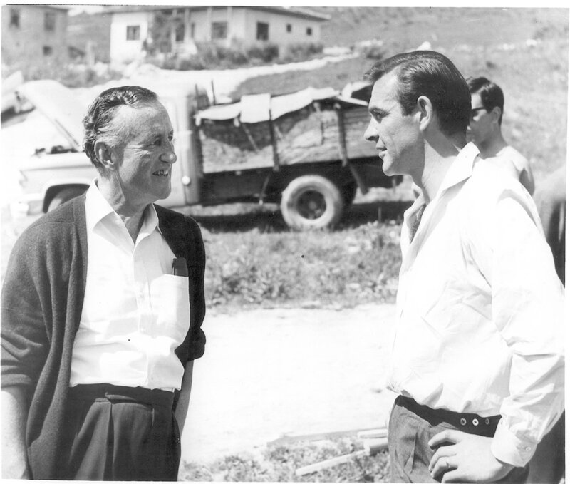 Two men talking outdoors