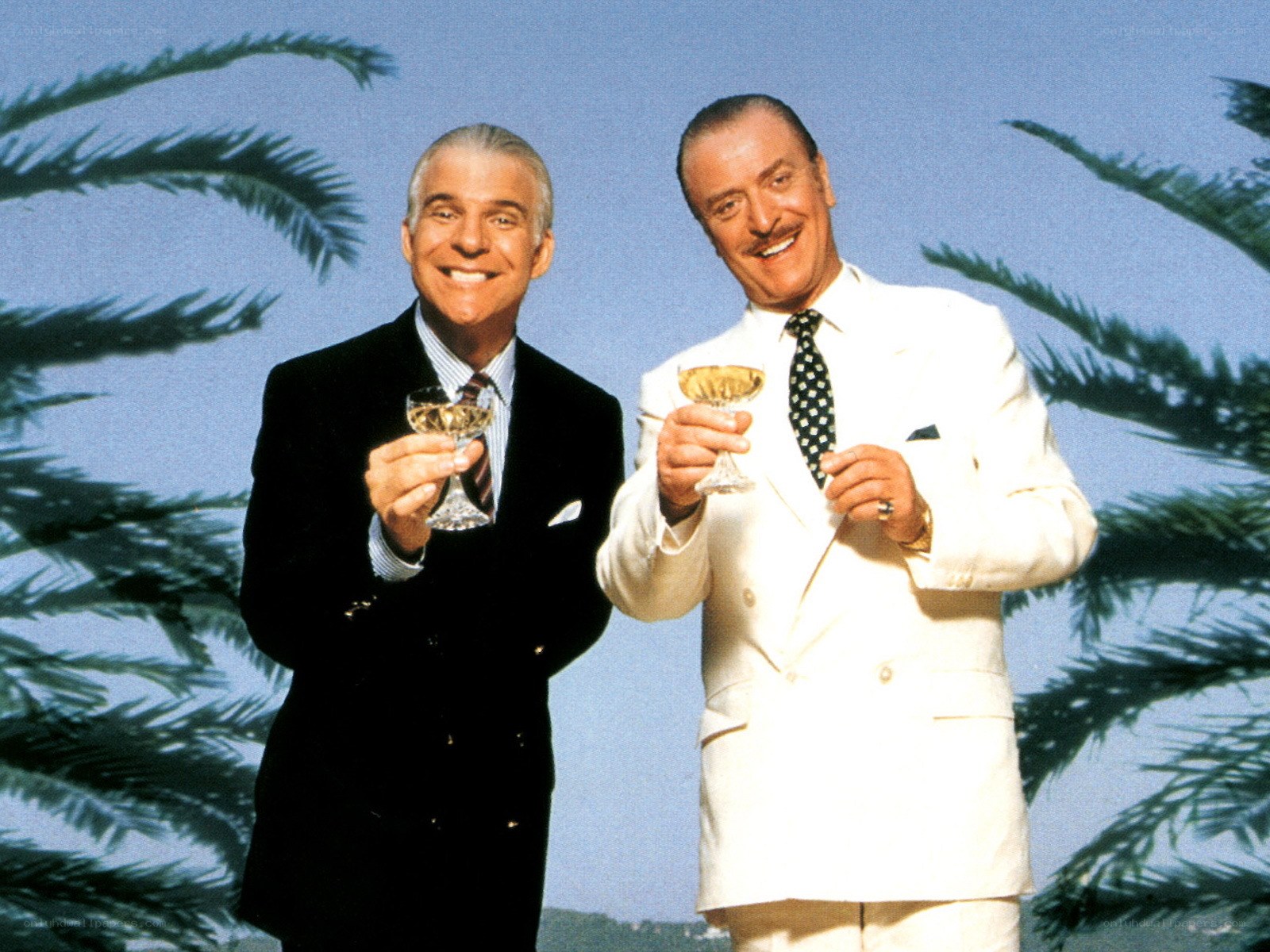 Two men toasting in suits