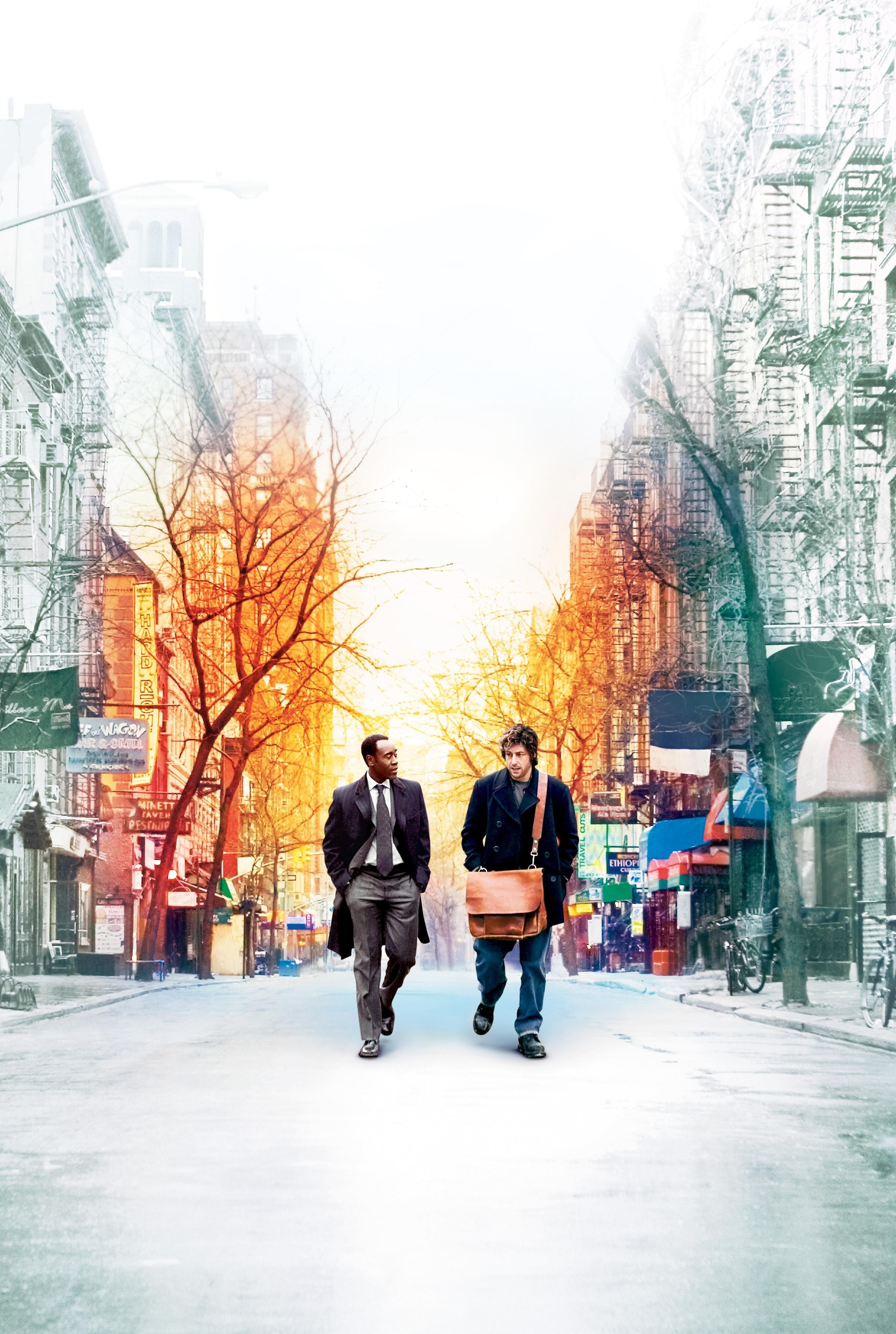 two men walking down a city street
