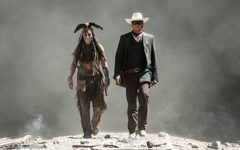 two men walking in a dusty landscape