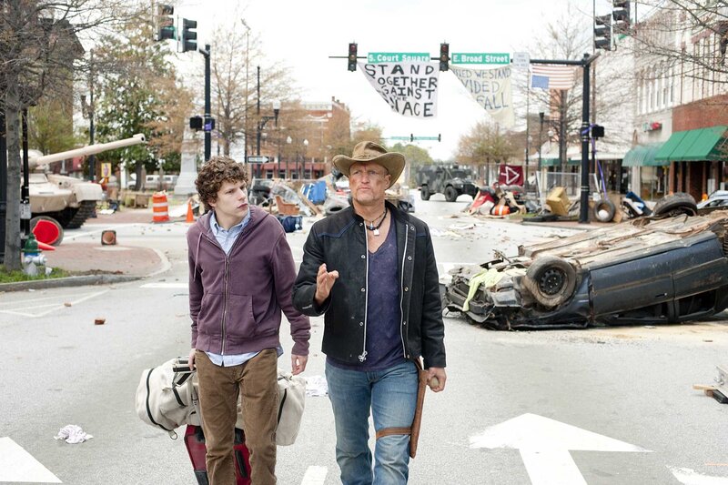 Two Men Walking in Street