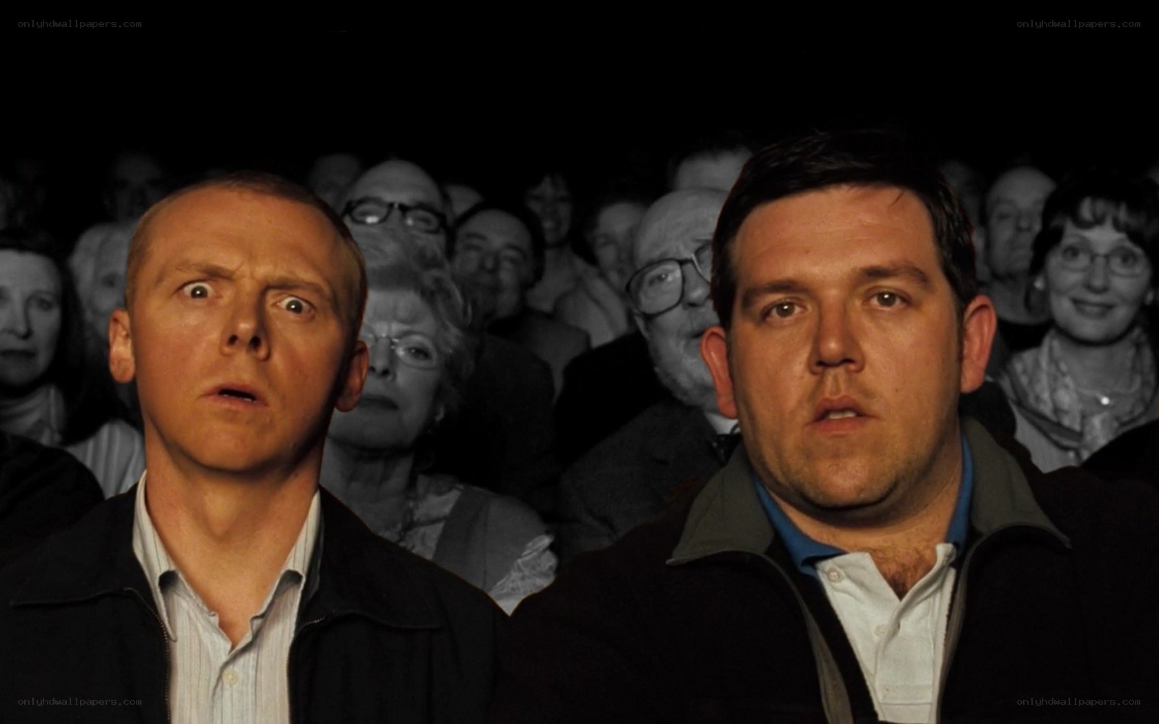 two men watching in shock