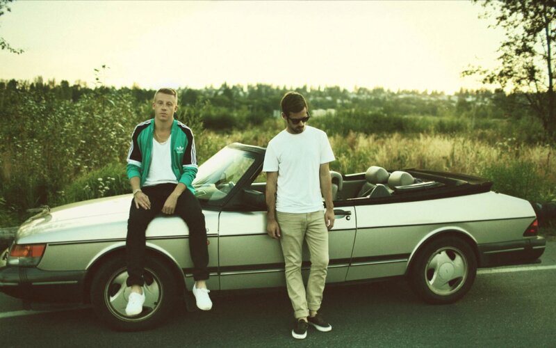 Two men with a convertible car