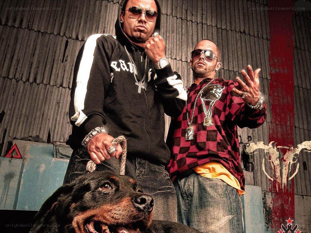 Two men with a dog in urban setting