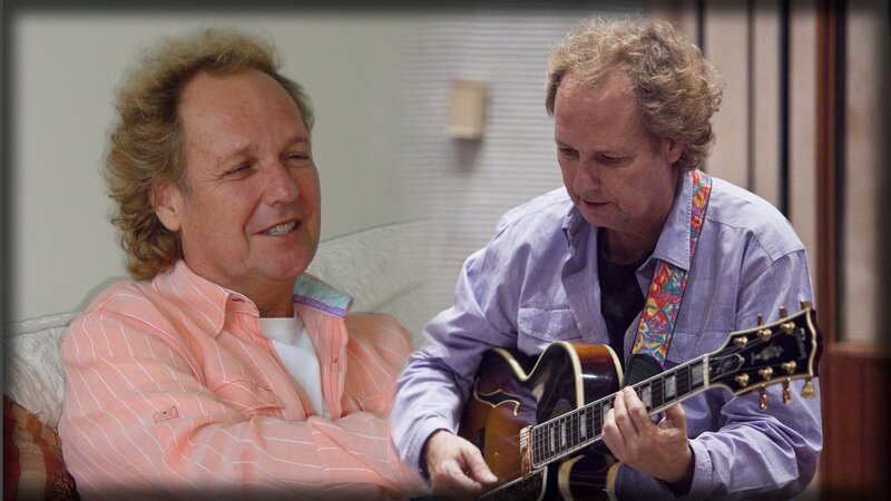 Two men with a guitar