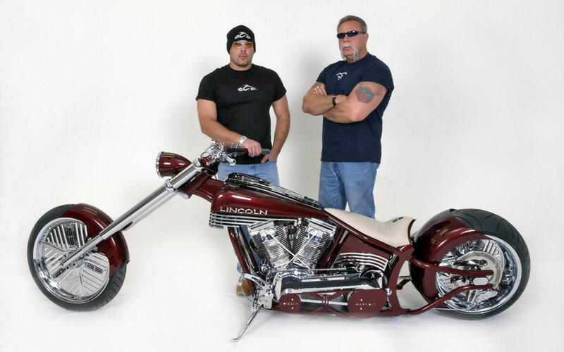 Two Men with a Motorcycle — Maroon