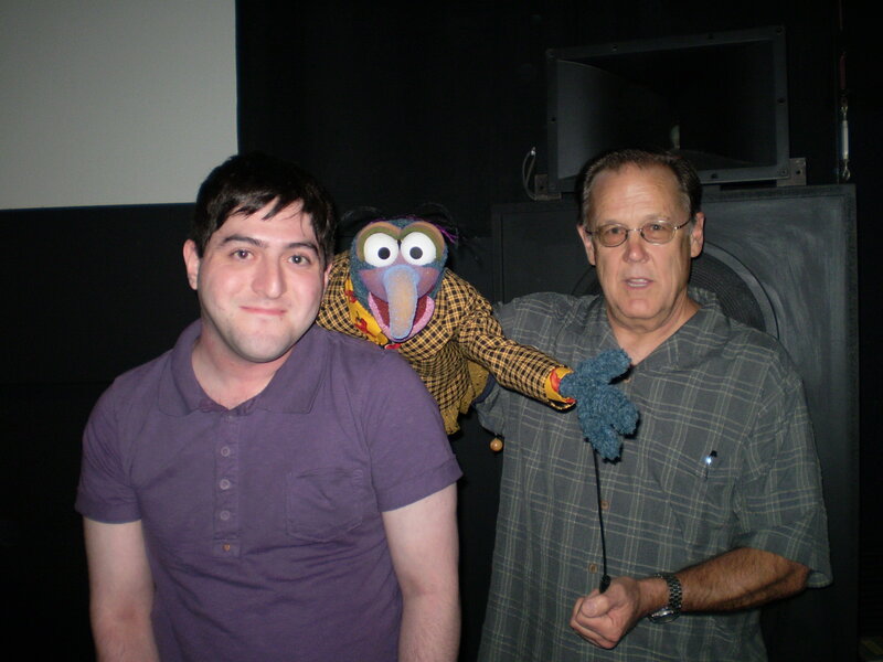 Two men with a puppet