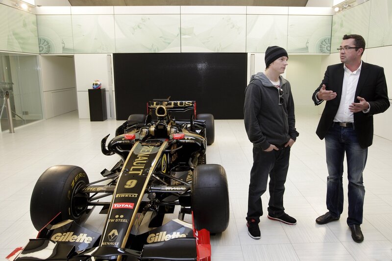 Two men with a race car