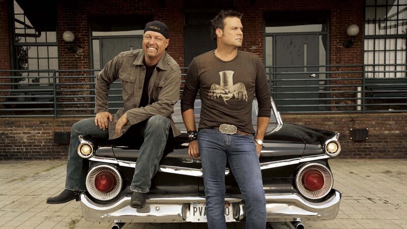 Two men with classic car