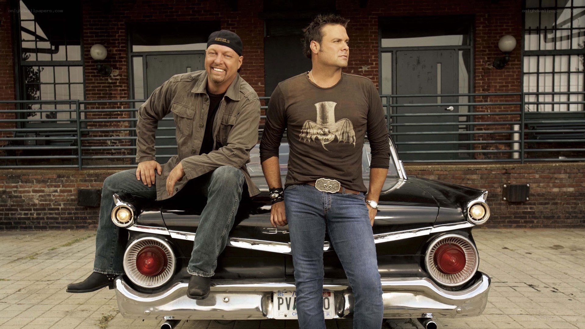 Two men with classic car