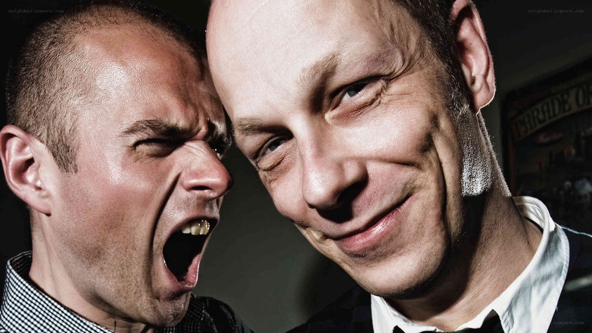 two men with contrasting expressions