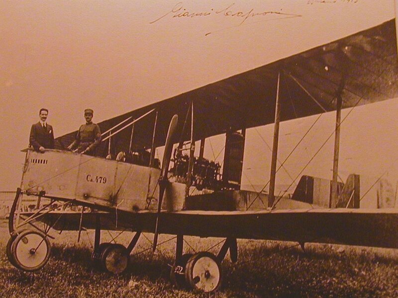 Two men with early biplane