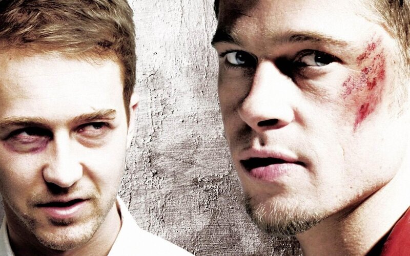 two men with facial injuries