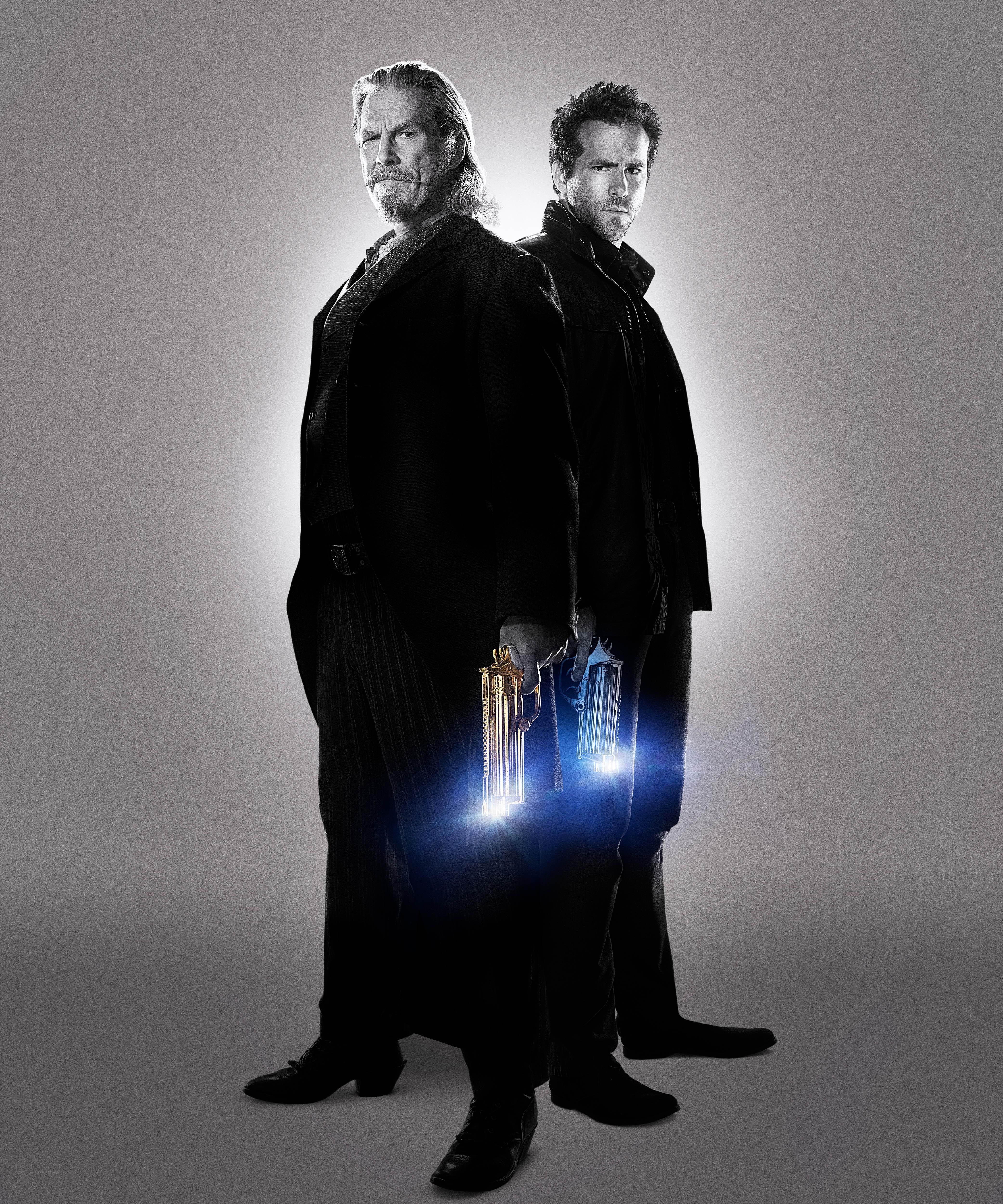 Two men with glowing guns