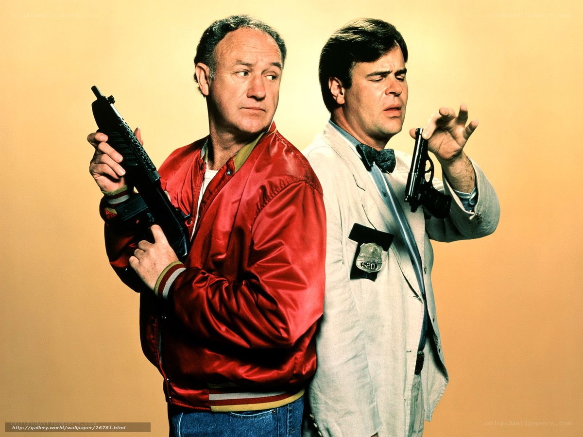 Two men with guns back to back