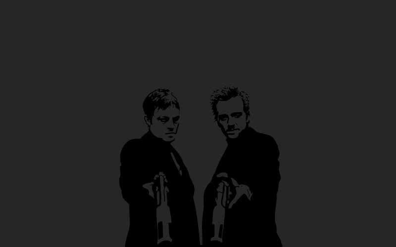 two men with guns silhouette