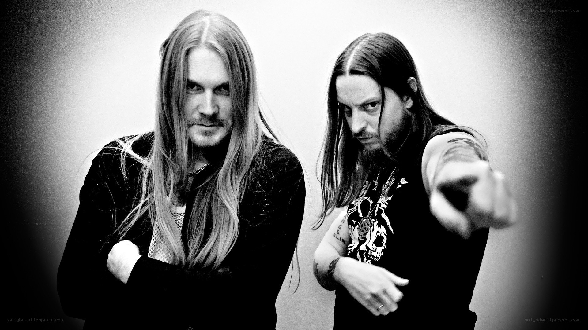 two men with long hair