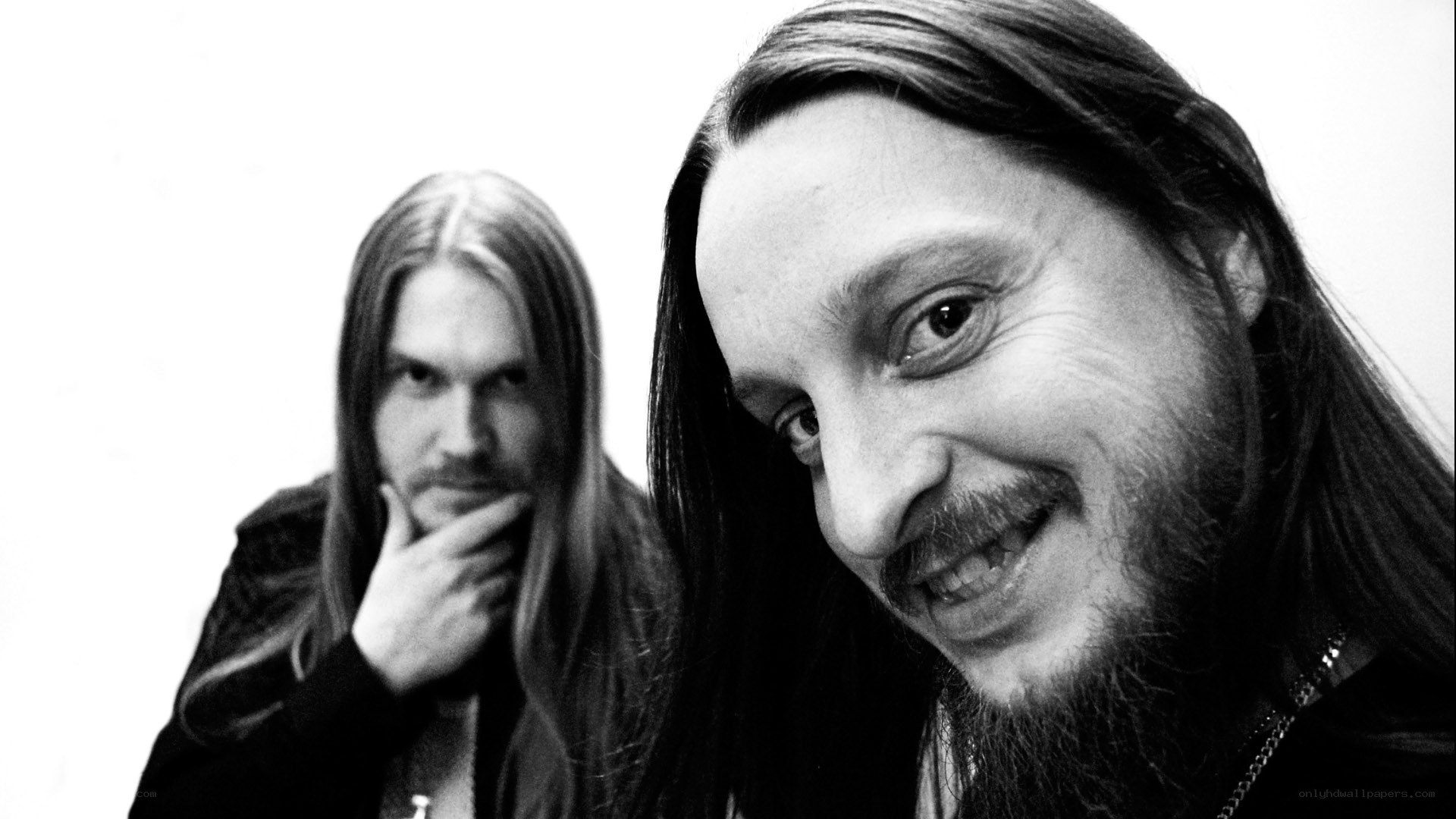 two men with long hair