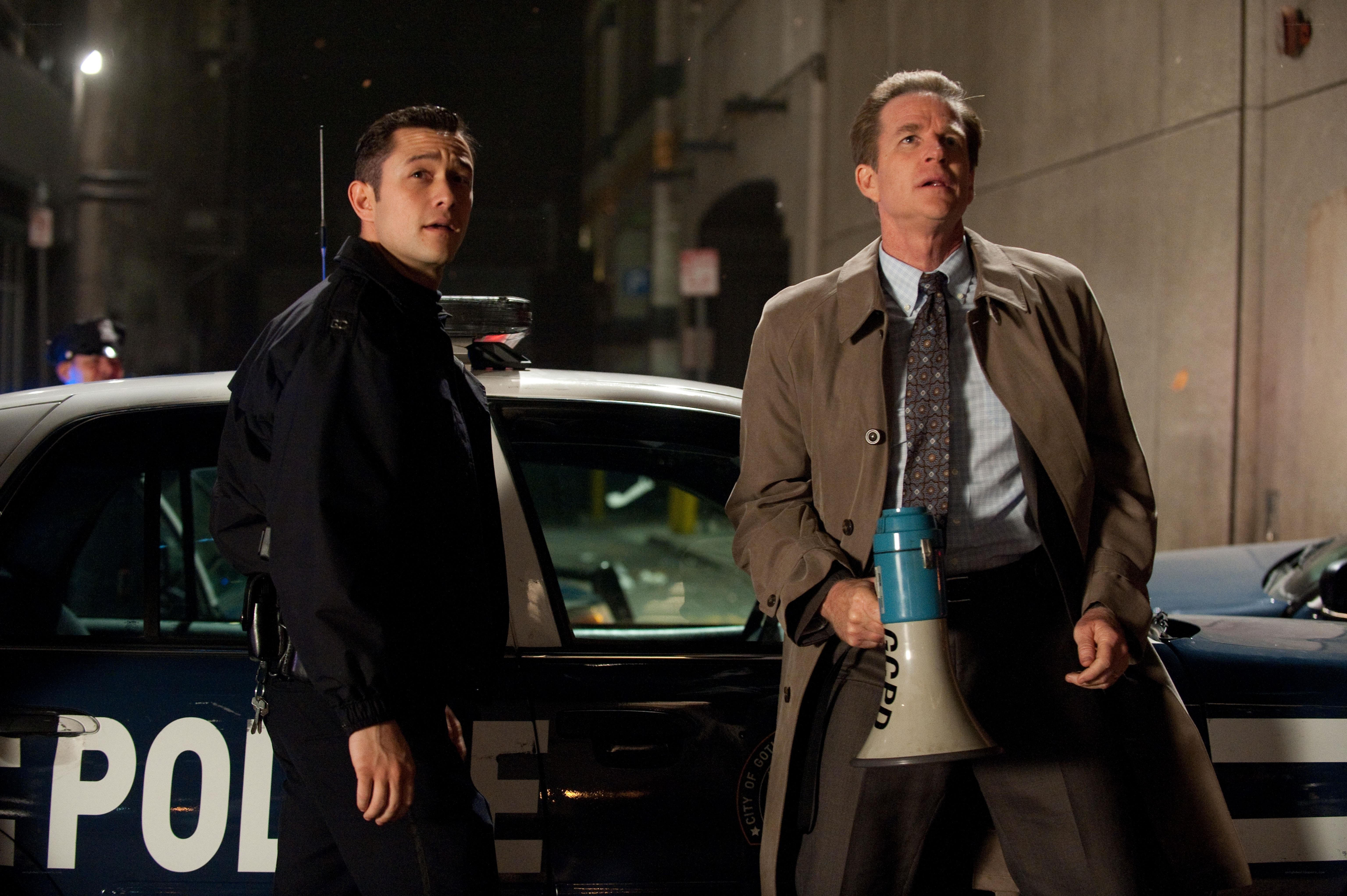 Two men with megaphone on street