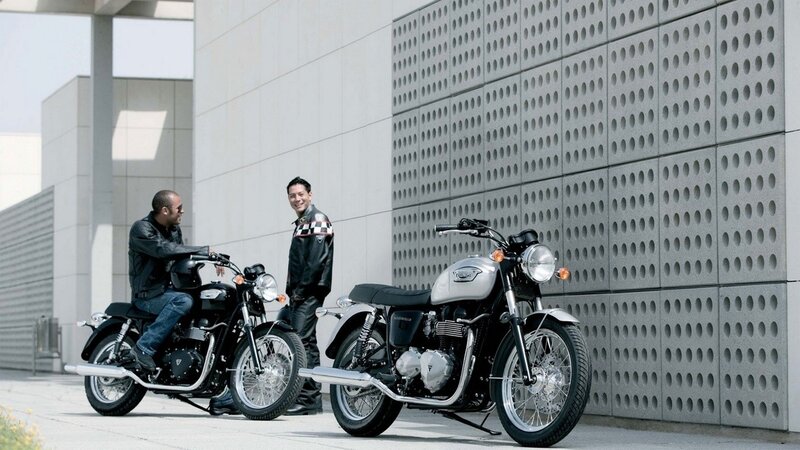 Two men with motorcycles