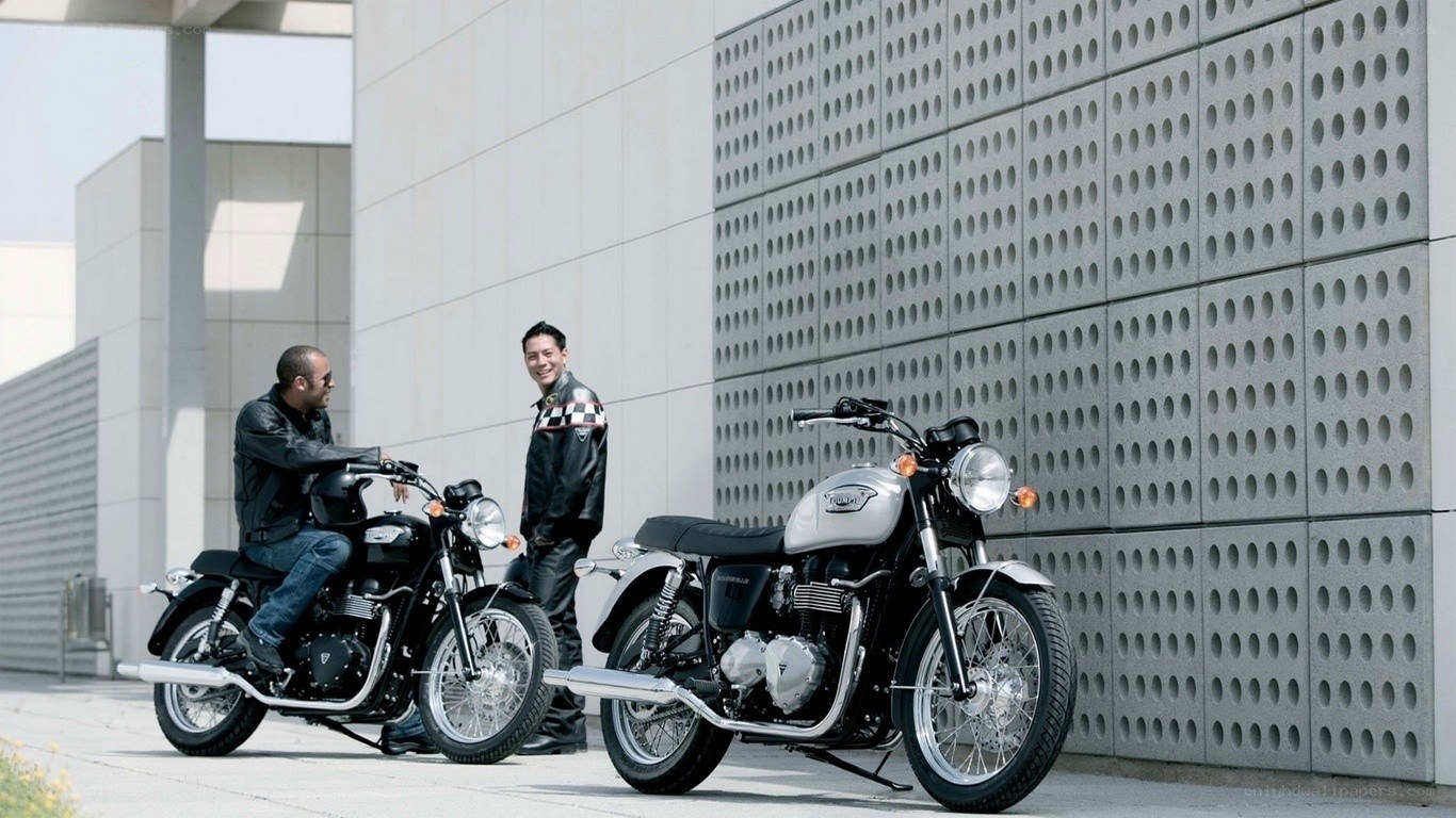 Two men with motorcycles