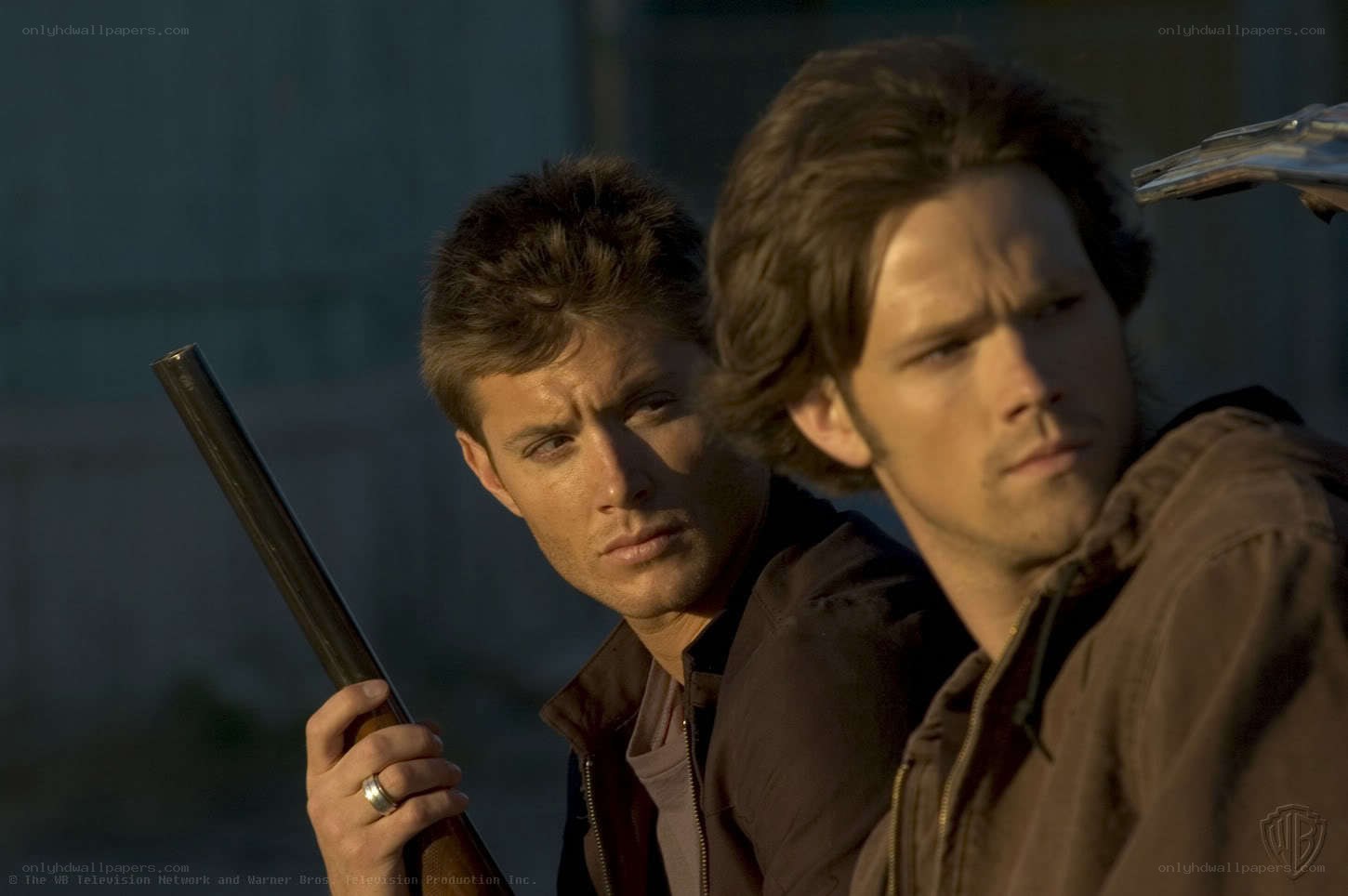 two men with shotgun