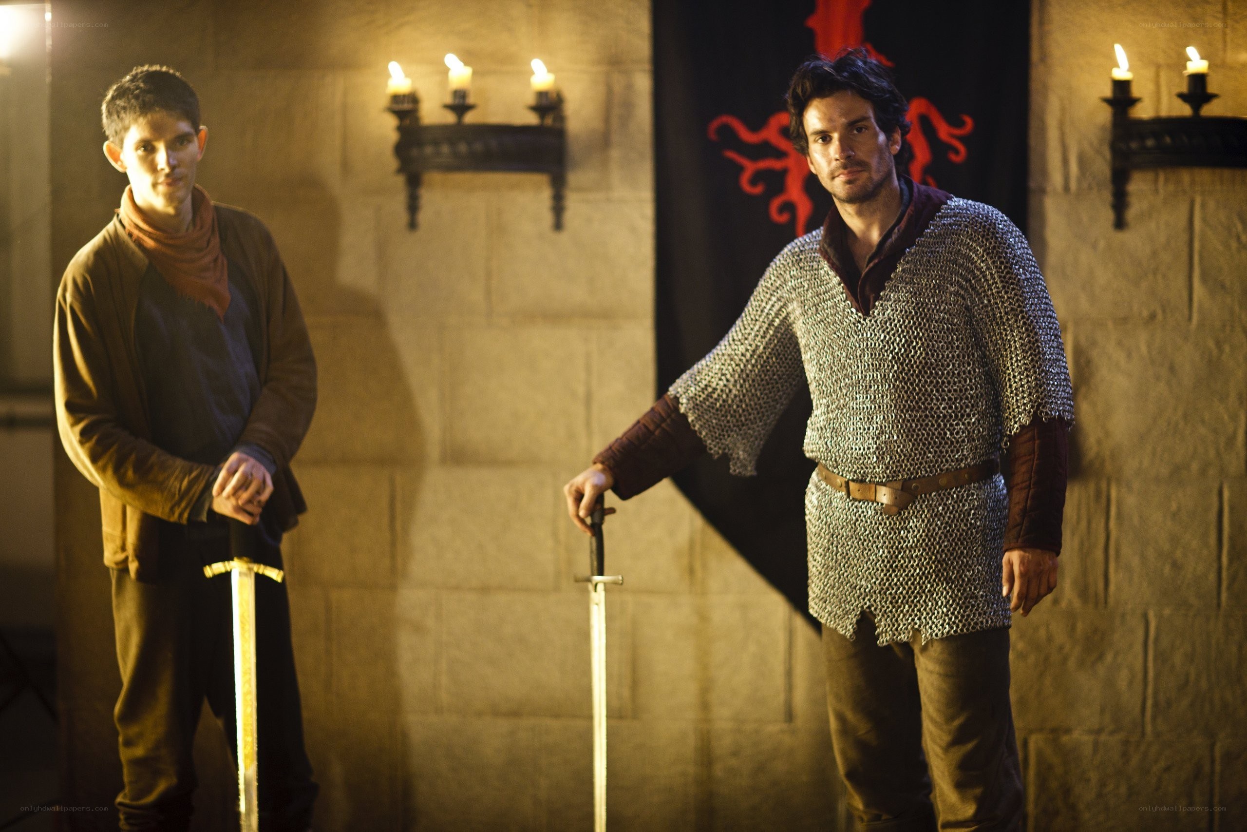 Two men with swords in a castle